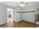 Spacious utility room with shelving and water heater at 633 Westbridge Rd, Fayetteville, GA 30214