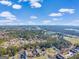 Wide aerial view of the community and surrounding landscape at 6036 Regent Mnr, Lithonia, GA 30058
