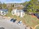Aerial view of condo building and surrounding neighborhood at 6036 Regent Mnr, Lithonia, GA 30058