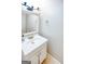Small bathroom with vanity, mirror and tiled floor at 6036 Regent Mnr, Lithonia, GA 30058