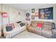 Living room with couches and eclectic wall art at 6036 Regent Mnr, Lithonia, GA 30058
