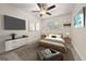 Staged bedroom with modern furniture and decor at 6667 Ridge Moore Dr, Peachtree Corners, GA 30360