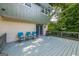 View of a deck with outdoor seating, perfect for entertaining and relaxation at 6667 Ridge Moore Dr, Peachtree Corners, GA 30360