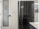 Kitchen with stainless steel refrigerator and custom pantry door at 6667 Ridge Moore Dr, Peachtree Corners, GA 30360