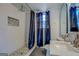Clean bathroom with subway tile shower, modern vanity, and window at 2173 Anderson Se Ave, Covington, GA 30014