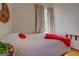 Charming bedroom with a queen bed and hardwood floors at 2173 Anderson Se Ave, Covington, GA 30014