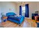 Well-lit bedroom with hardwood floors and ample space at 2173 Anderson Se Ave, Covington, GA 30014