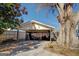 Covered carport provides parking and storage space at 2173 Anderson Se Ave, Covington, GA 30014
