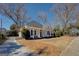 Charming white house with a front porch and well-maintained lawn at 2173 Anderson Se Ave, Covington, GA 30014