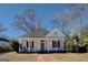Quaint white house with a porch and brick walkway at 2173 Anderson Se Ave, Covington, GA 30014