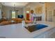 Modern kitchen island with a farmhouse sink and stainless steel faucet at 2173 Anderson Se Ave, Covington, GA 30014