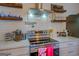 Bright kitchen featuring stainless steel appliances and white subway tile backsplash at 2173 Anderson Se Ave, Covington, GA 30014
