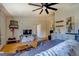 Living room with hardwood floors, sectional sofa, and TV at 2173 Anderson Se Ave, Covington, GA 30014