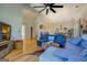 Spacious living area with hardwood floors, sectional sofa, and view of kitchen at 2173 Anderson Se Ave, Covington, GA 30014