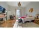 Spacious main bedroom with fireplace and hardwood floors at 2173 Anderson Se Ave, Covington, GA 30014