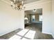 Dining room with chandelier and view of living room at 221 Stagecoach Pass, Temple, GA 30179