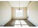 Simple dining area with chandelier and window at 221 Stagecoach Pass, Temple, GA 30179