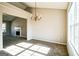 Bright dining room with a chandelier and fireplace at 221 Stagecoach Pass, Temple, GA 30179