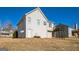 House exterior showcasing a deck and backyard at 221 Stagecoach Pass, Temple, GA 30179