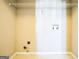 Laundry room with shelving and hookups for washer and dryer at 221 Stagecoach Pass, Temple, GA 30179
