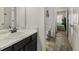 Small bathroom with a single vanity and a view of a bedroom at 120 Emerson Trl, Covington, GA 30016