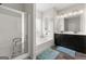 Bathroom boasts a double vanity, soaking tub, and a walk-in shower at 120 Emerson Trl, Covington, GA 30016