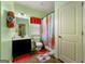 Simple bathroom with a toilet, shower, and vanity at 120 Emerson Trl, Covington, GA 30016
