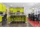 Bright kitchen with lime green cabinets, island, and breakfast area at 120 Emerson Trl, Covington, GA 30016