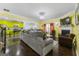 Spacious living room with hardwood floors and a view of the kitchen at 120 Emerson Trl, Covington, GA 30016
