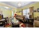 Living room with a comfortable sofa and decorative accents at 120 Emerson Trl, Covington, GA 30016