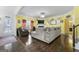Cozy living room with hardwood floors and a fireplace at 120 Emerson Trl, Covington, GA 30016
