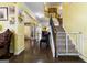 View of a staircase with a baby gate, leading upstairs at 120 Emerson Trl, Covington, GA 30016