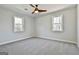 Bedroom with ceiling fan and carpet at 234 Willis Rd, Sharpsburg, GA 30277