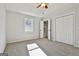 Bedroom with carpet, ceiling fan, and private bath at 234 Willis Rd, Sharpsburg, GA 30277