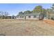 Newly built home with a detached shed at 234 Willis Rd, Sharpsburg, GA 30277
