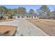 Ranch style home with a long driveway at 234 Willis Rd, Sharpsburg, GA 30277