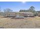 Back of house showing patio and pergola at 234 Willis Rd, Sharpsburg, GA 30277