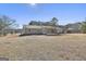 Back of house showing patio and pergola at 234 Willis Rd, Sharpsburg, GA 30277