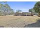 Back of house showing patio and pergola at 234 Willis Rd, Sharpsburg, GA 30277