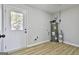 Laundry room with new flooring and water heater at 234 Willis Rd, Sharpsburg, GA 30277