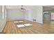 Living room with hardwood floors and ceiling fan at 234 Willis Rd, Sharpsburg, GA 30277