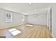 Bright living room with hardwood floors and recessed lighting at 234 Willis Rd, Sharpsburg, GA 30277
