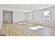 Bright living room featuring hardwood floors and recessed lighting at 234 Willis Rd, Sharpsburg, GA 30277