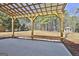 Covered patio with pergola and spacious backyard at 234 Willis Rd, Sharpsburg, GA 30277