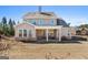 Inviting backyard with covered patio and a peaceful setting at 244 Sturry Dr, Mcdonough, GA 30252