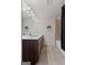 Bathroom featuring a large vanity, mirror, and a tiled shower/bathtub combination with black curtain at 244 Sturry Dr, Mcdonough, GA 30252