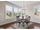 Breakfast nook with a round table, four chairs, and large windows at 244 Sturry Dr, Mcdonough, GA 30252