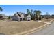 Well maintained 2-story home with a covered front porch on a corner lot at 244 Sturry Dr, Mcdonough, GA 30252