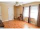 Hardwood floor bedroom with door to exterior at 626 Barksdale Dr, Forest Park, GA 30297