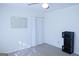 Bedroom with mirrored closet and ceiling fan at 626 Barksdale Dr, Forest Park, GA 30297